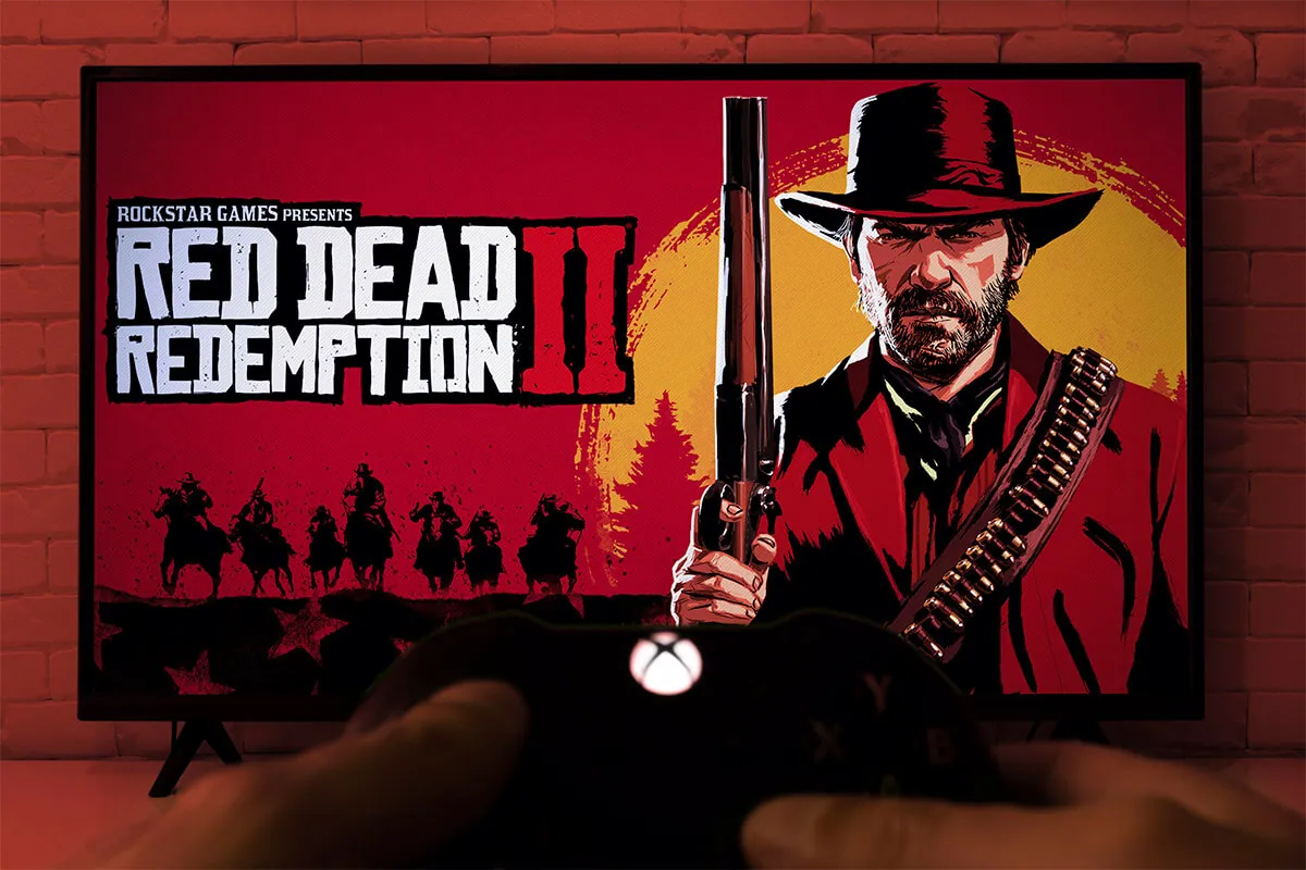 Boy playing Red Dead Redemption II