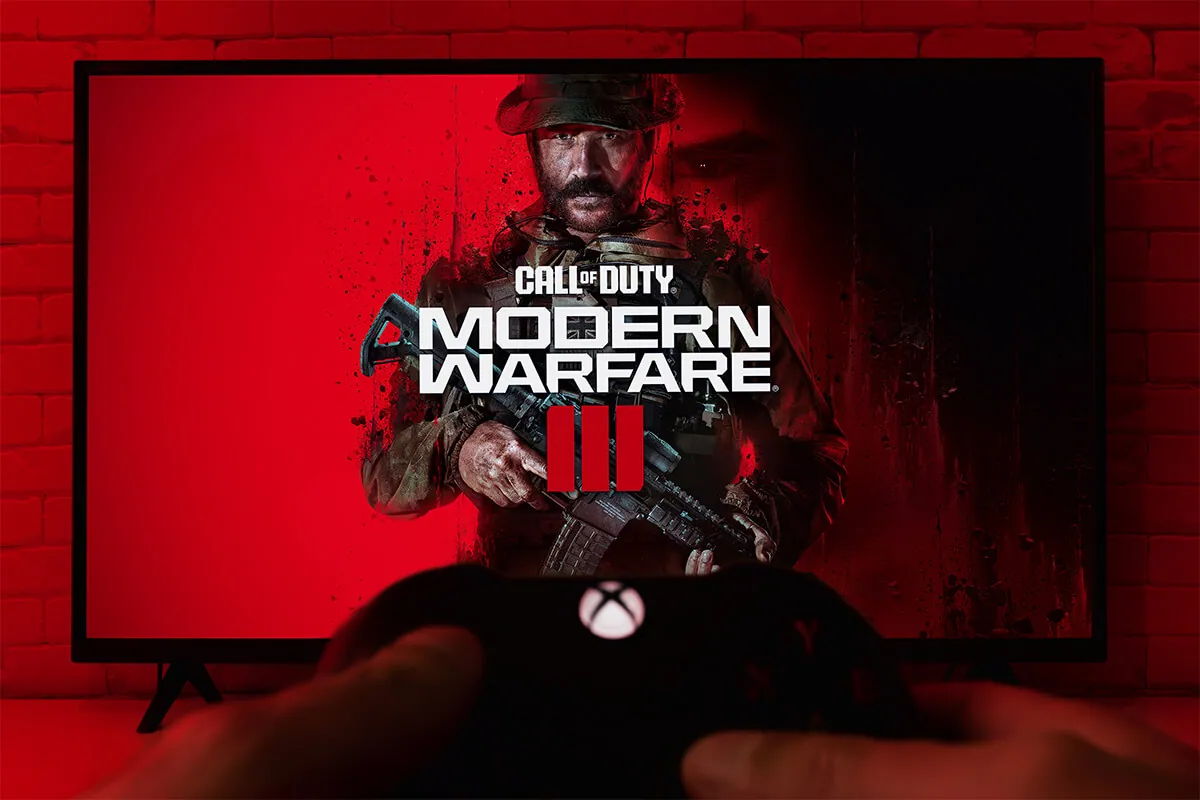 Playing Call of Duty Modern Warfare III with Xbox controller.