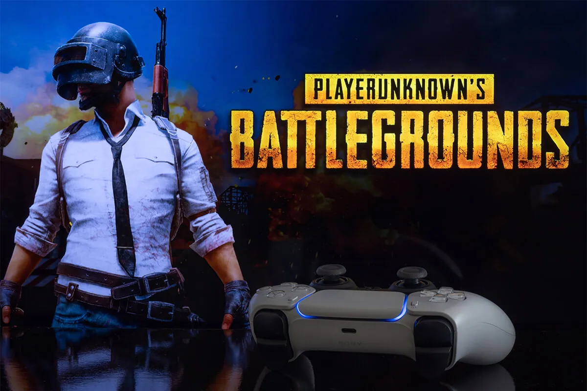 PUBG on Playstation 5 screen with Dual Sense controller, selective focus.