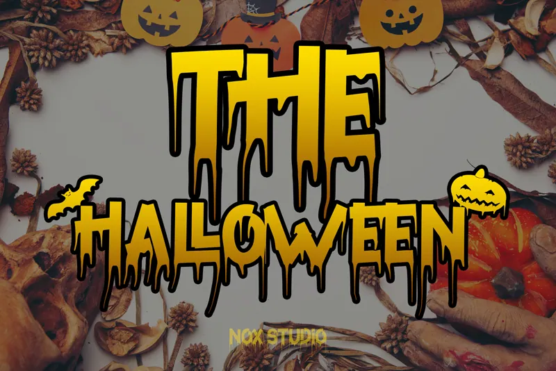 Enjoy a spooktacular design with Halloween-themed text featuring pumpkins, leaves, and pinecones in the background. Elevate your creations using our free Halloween font, adding an extra touch of eerie charm to your festive graphics.